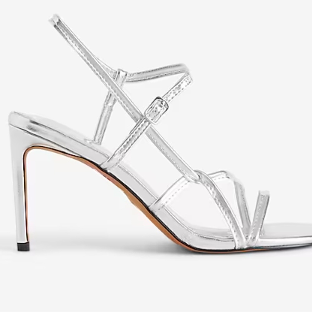 NWT. Express silver strappy sandals in size 8.